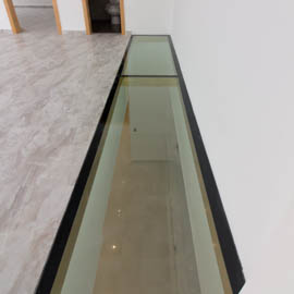 piso de vidro em apartamento duplex